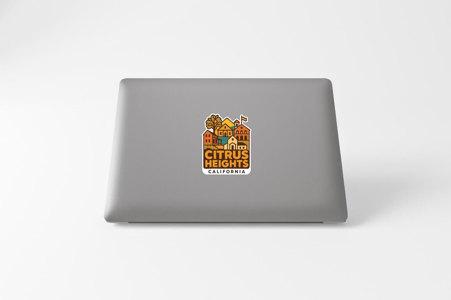 a sticker on the back of a laptop that says "Citrus Heights, California".