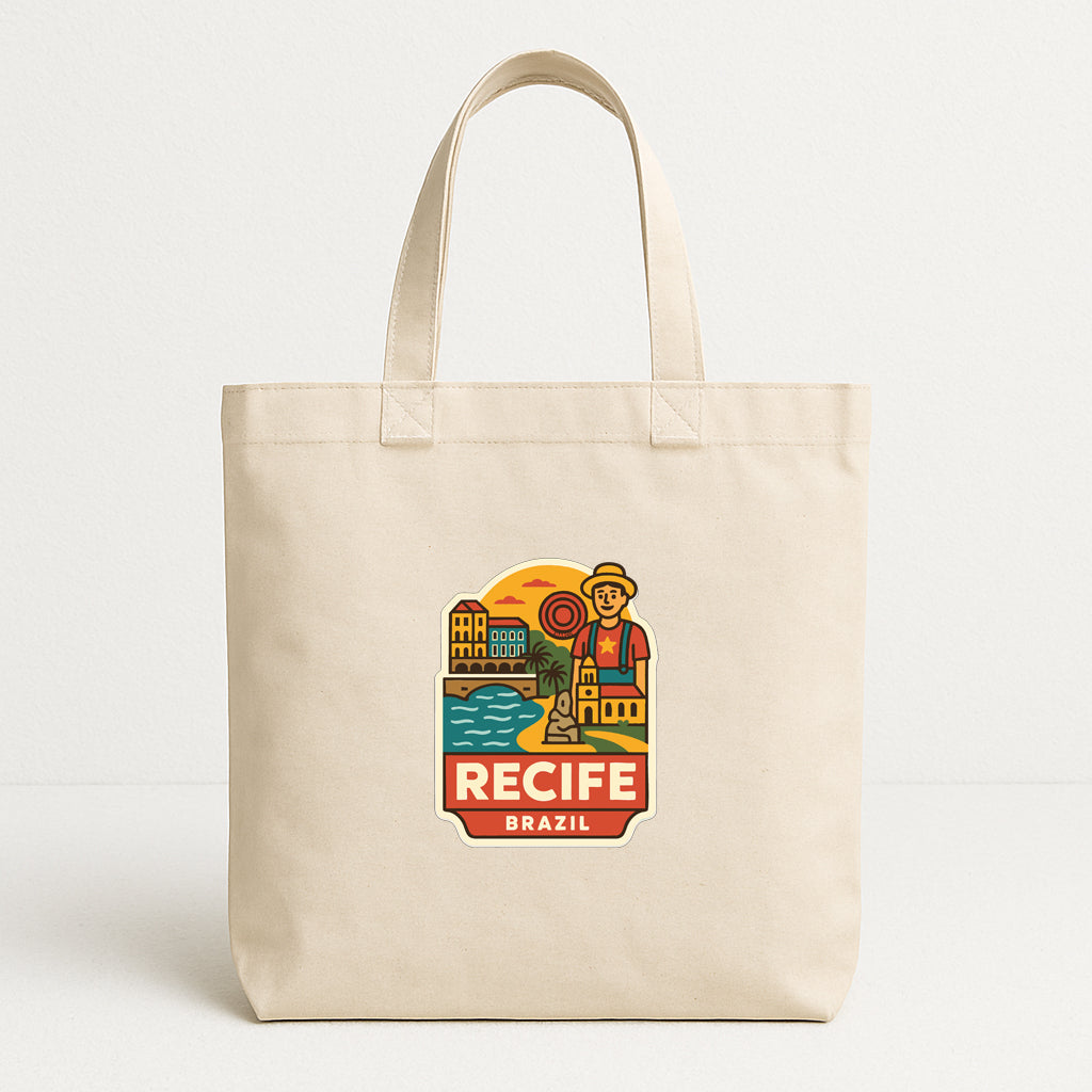 A beige tote bag with a colorful graphic design depicting a cityscape and the text "RECIFE BRAZIL" printed on it.