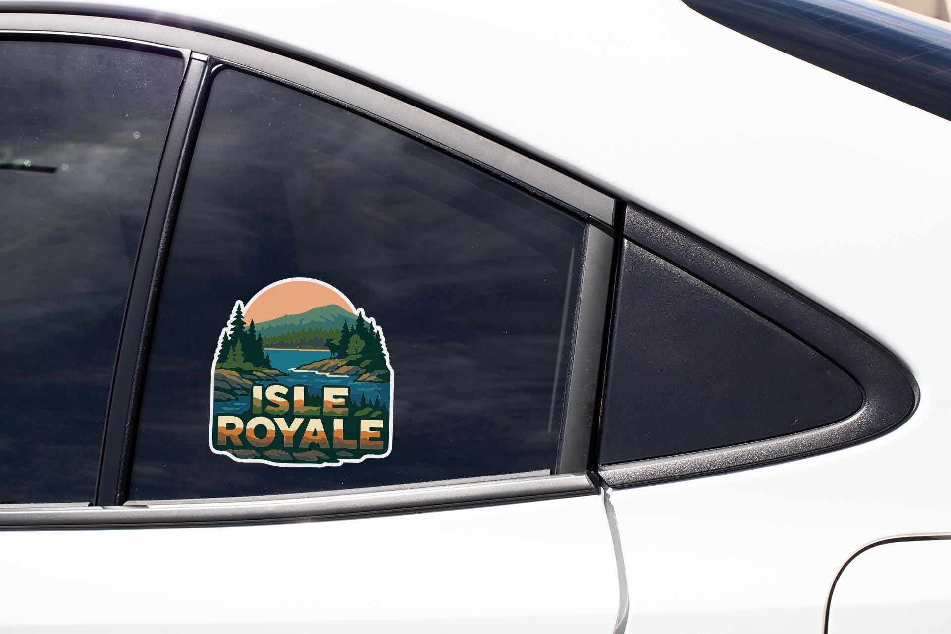 A sticker on the side of a car window that says " Isle Royal".