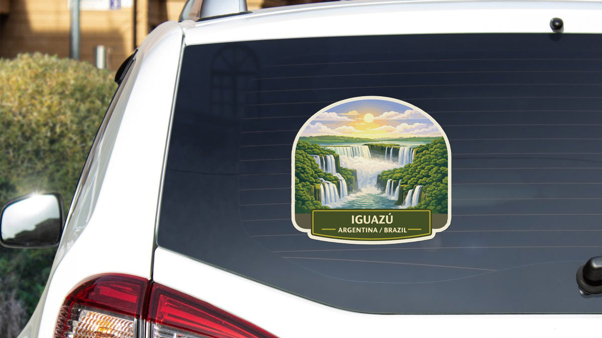 A sticker on the rear window of a car depicting the Iguazu waterfall in Argentina and Brazil.