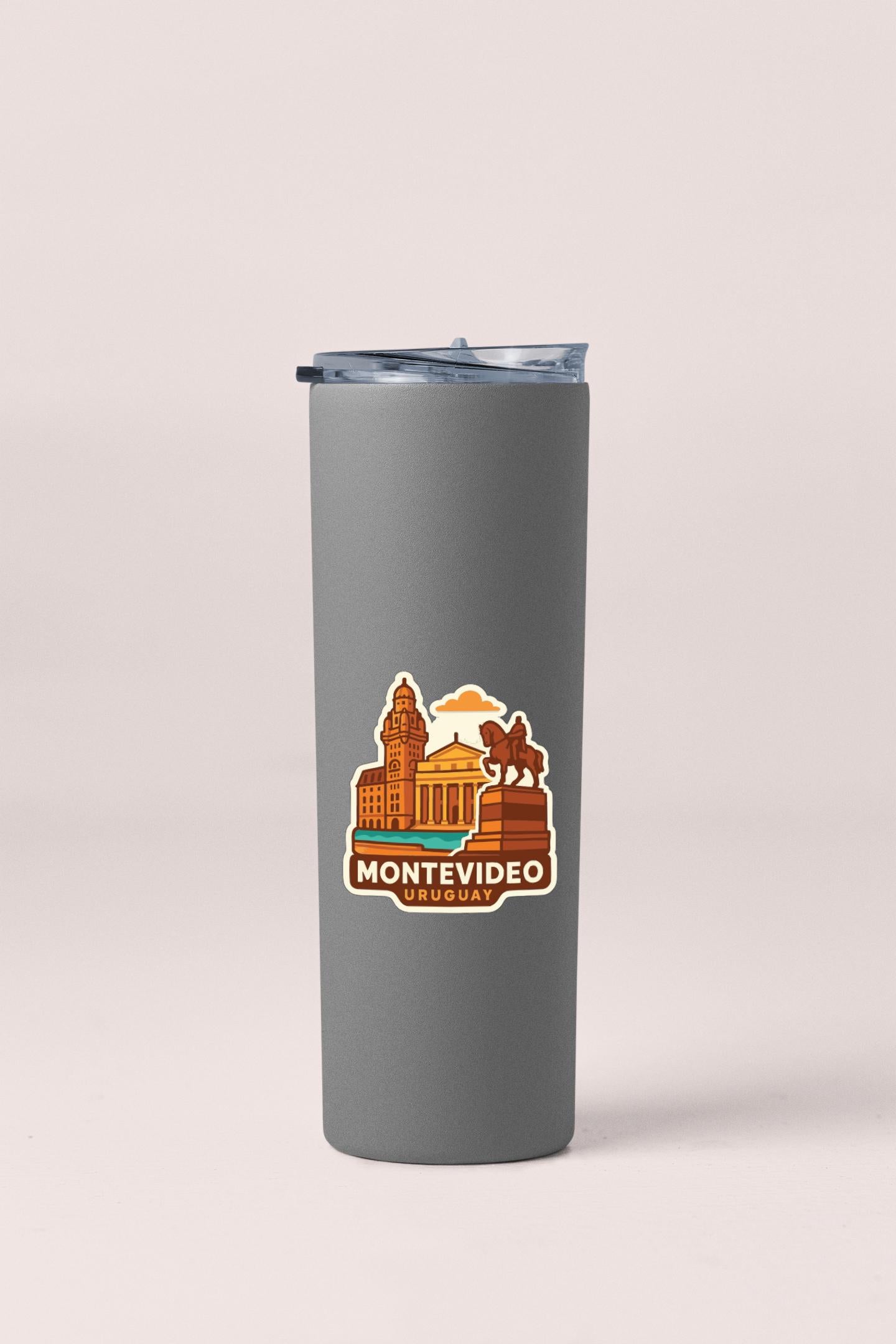 A gray insulated tumbler with a printed label that says "MONTEVIDEO Uruguay".