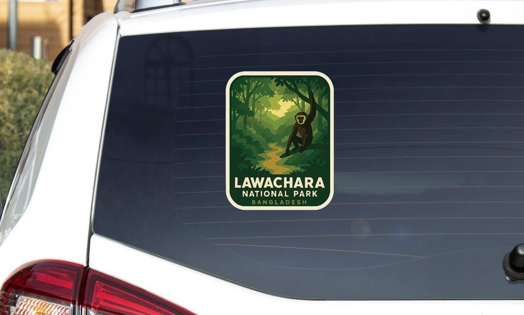 a sticker on the rear window of a car that says "LAWACHARA NATIONAL PARK BANGLADESH".