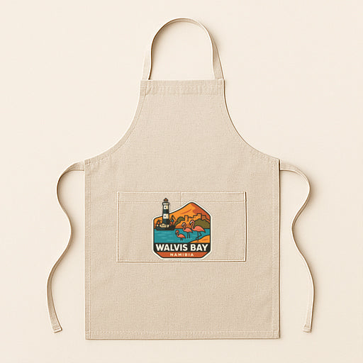 A beige apricot with a graphic design depicting a lighthouse and a beach scene, along with the text "WALVIS BAY".