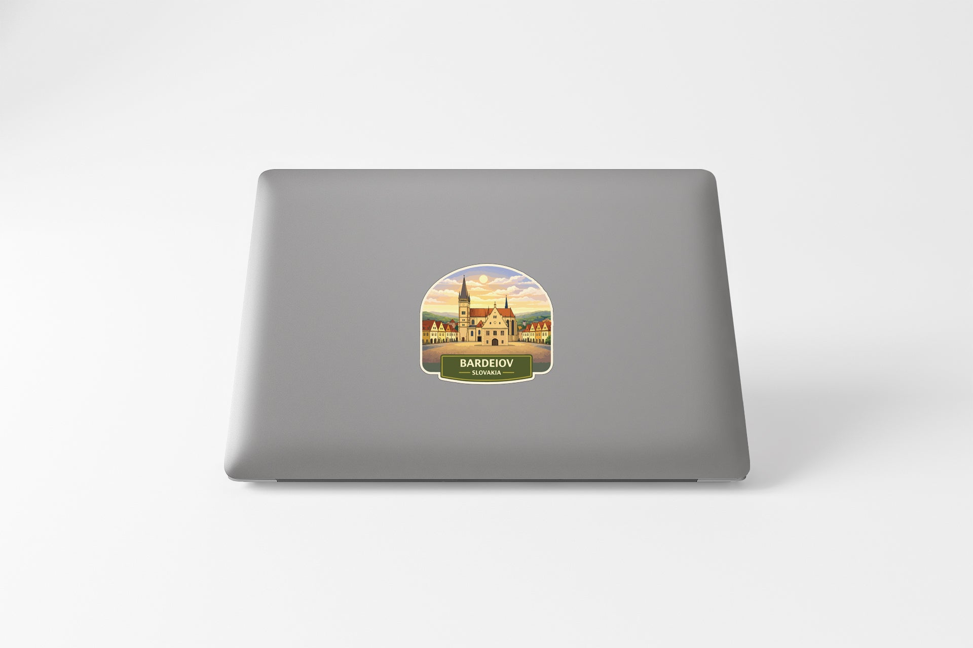 a sticker of a castle on a laptop.