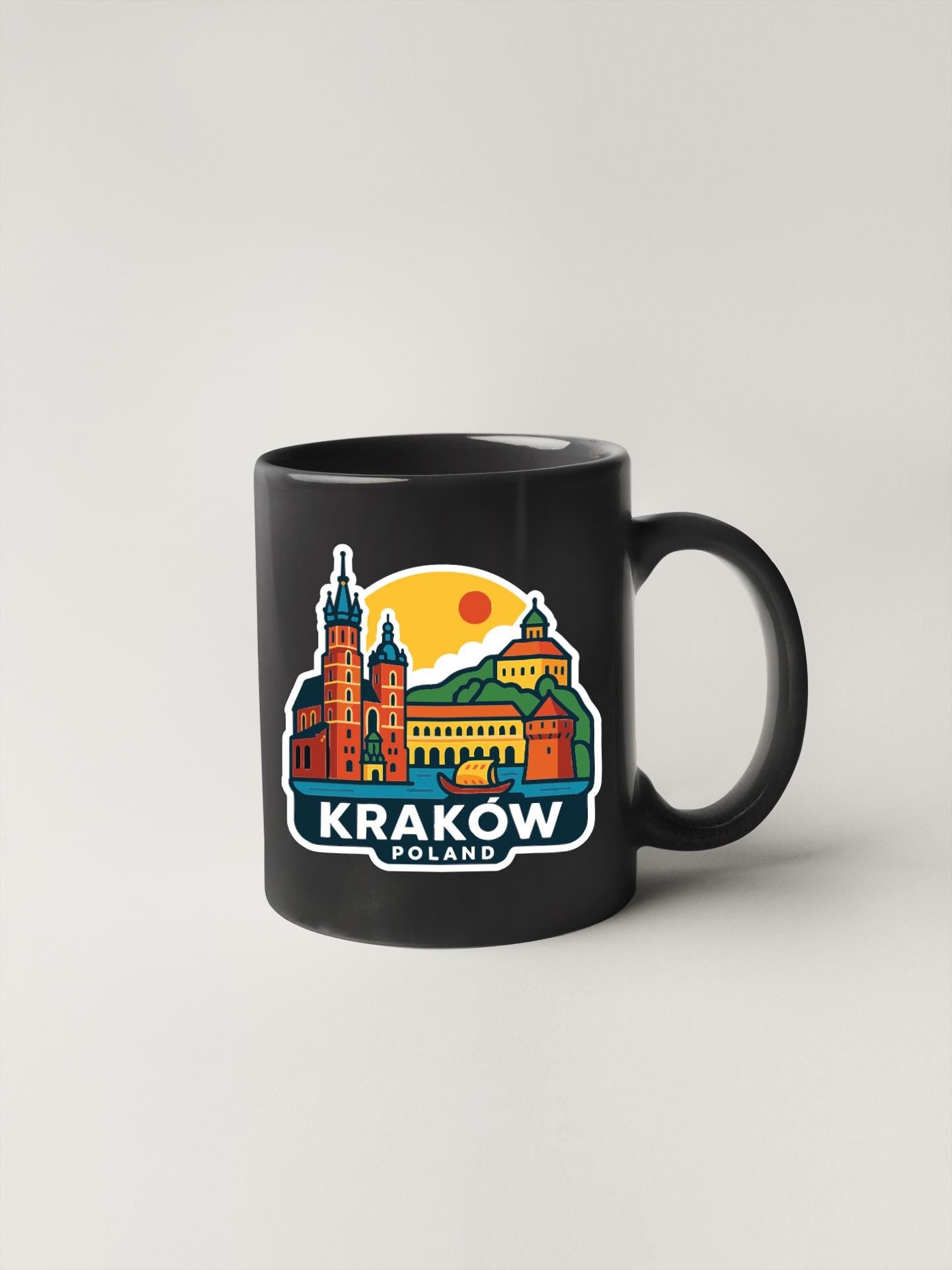 A black coffee mug with a colorful illustration of the Krakow, Poland skyline and a sun in the background.