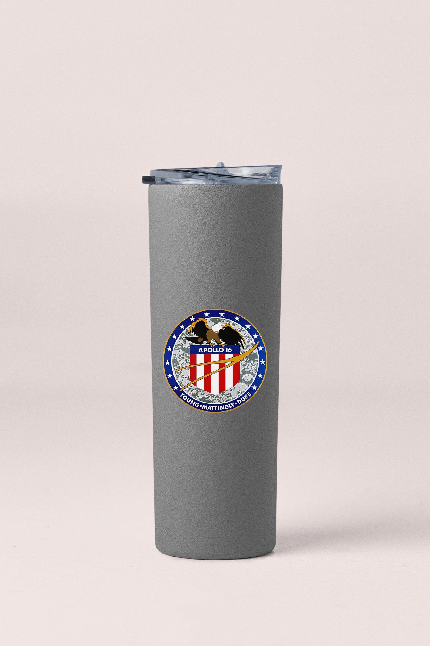 a stainless steel tumbler with an eagle emblem