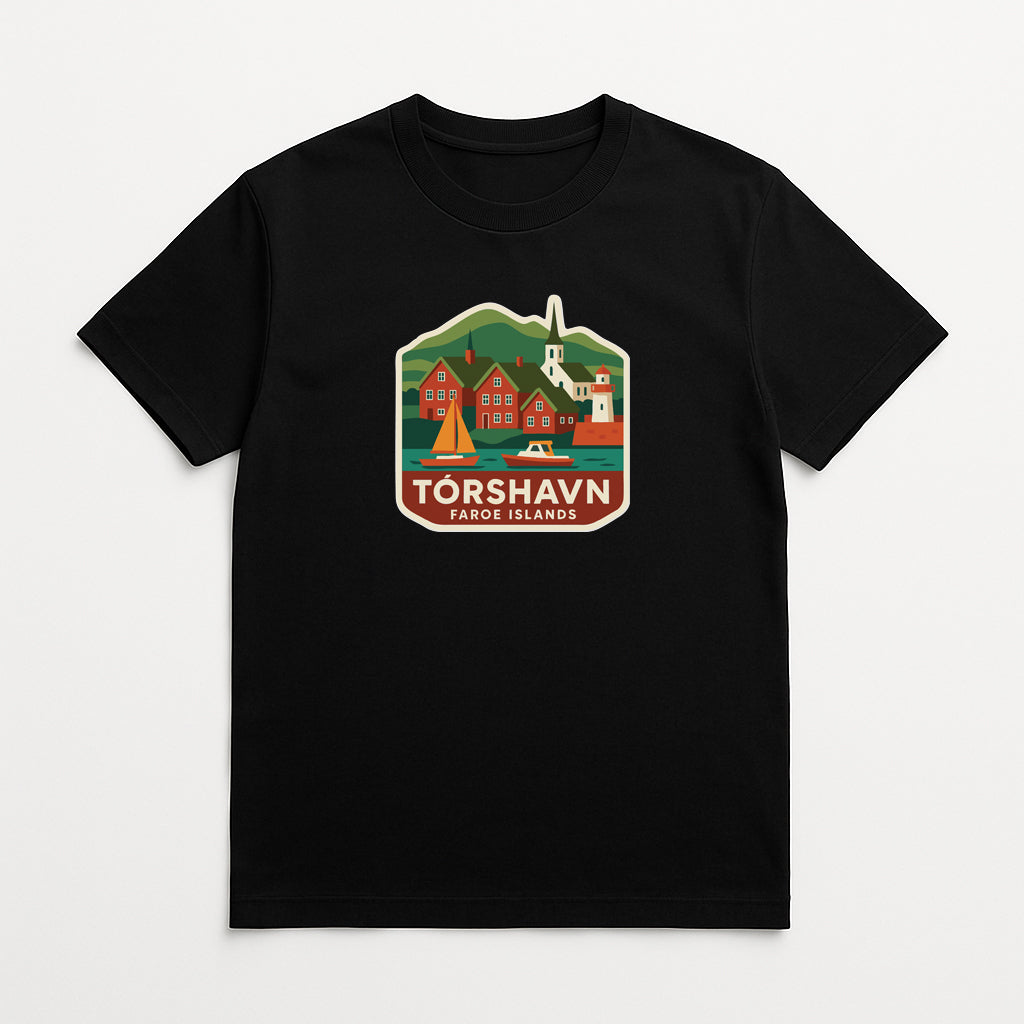 A black t-shirt with a graphic design depicting a scenic landscape with a mountain, buildings, and a church.
