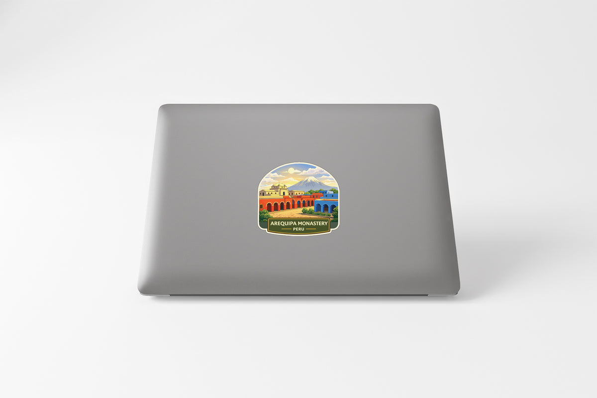 a sticker on the back of a laptop, depicting a colorful and vibrant scene.