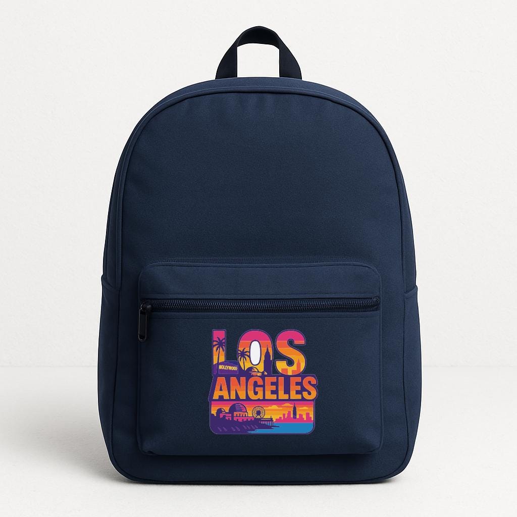 A navy blue backpack with a colorful graphic of Los Angeles printed on it.