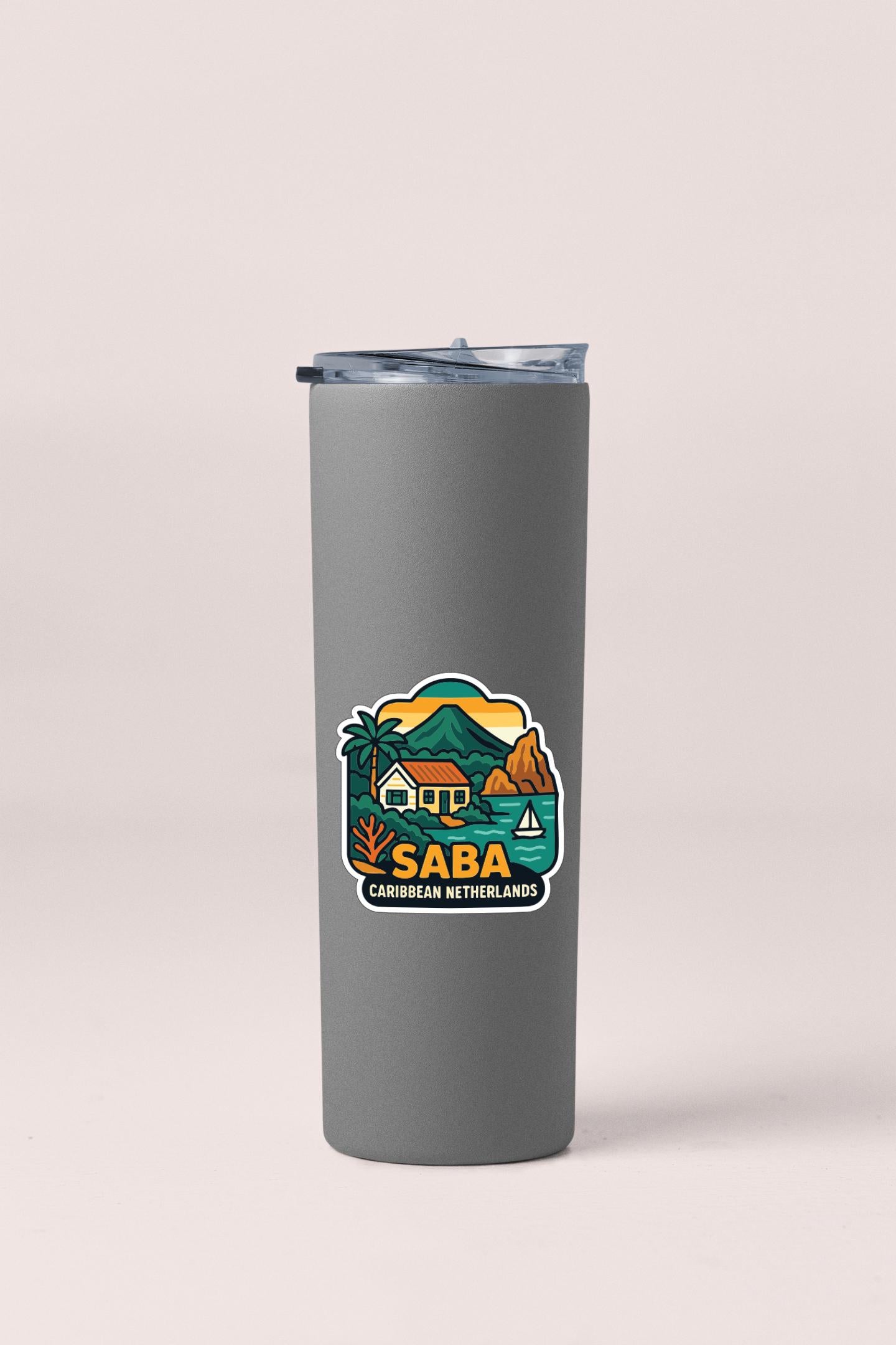 A gray insulated tumbler with a sticker depicting a tropical island landscape and the text "Saba Caribbean Netherlands".
