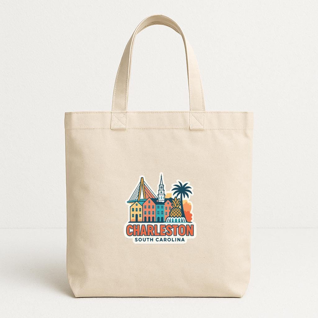 A beige tote bag with a printed design of the Charleston skyline and the text " Charleston South Carolina" printed on it.