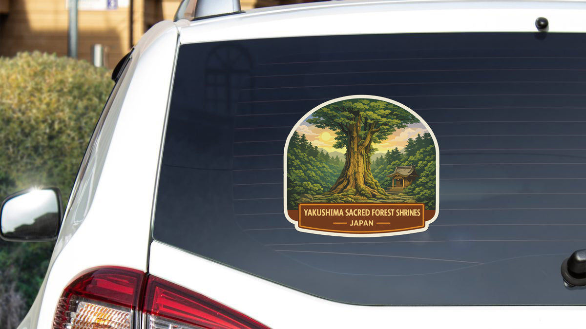 a sticker on the rear window of a white car, depicting a forest scene with a temple in the background.