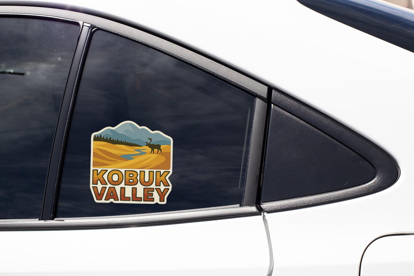 A sticker on the side of a car window that says "KOBUK VALLEY".