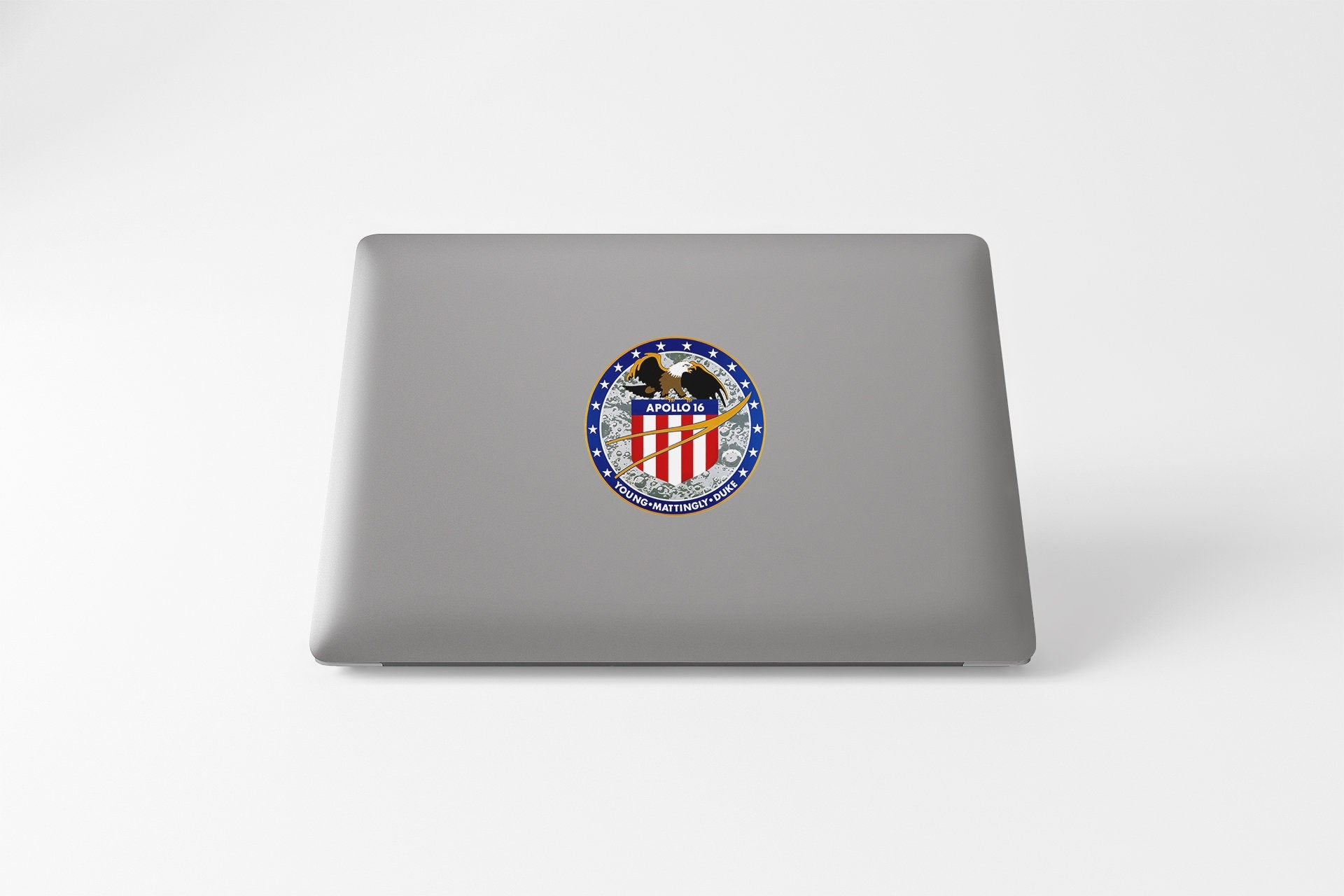 a laptop with a sticker of an eagle on it