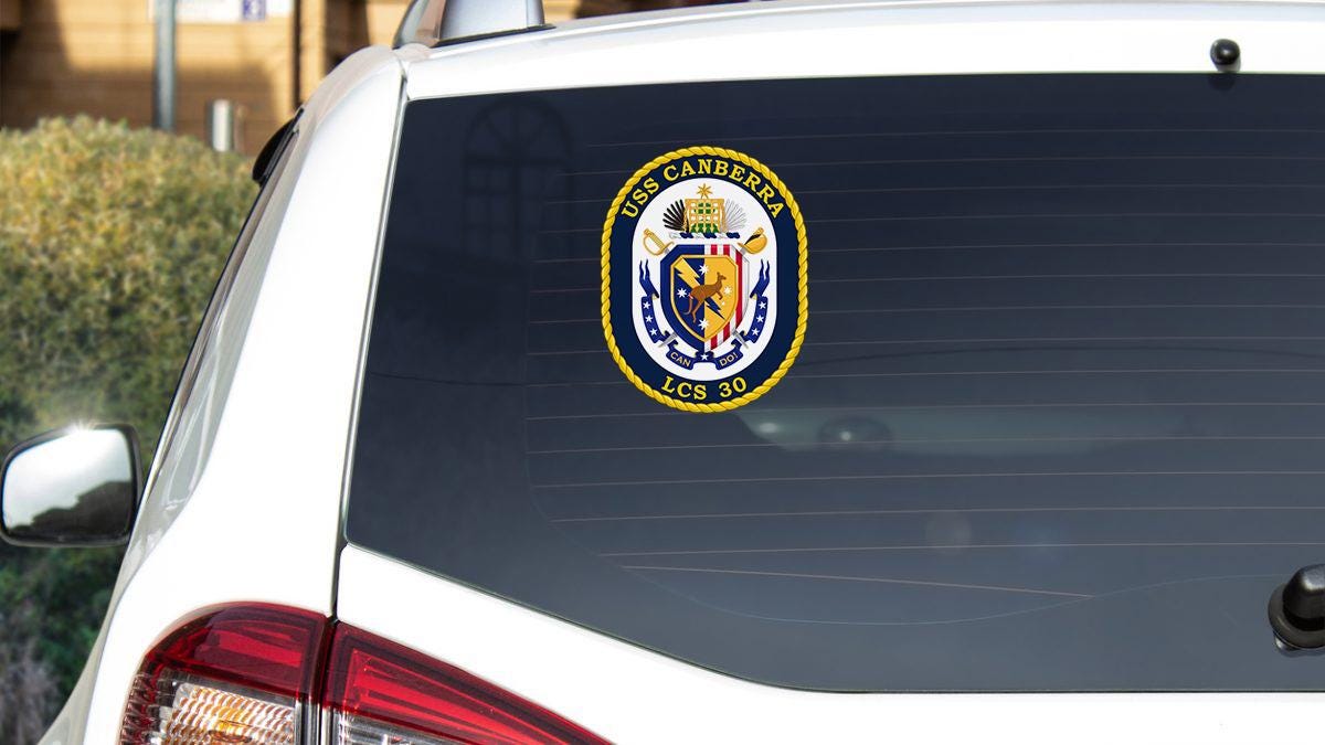 a car with a sticker on the back of it