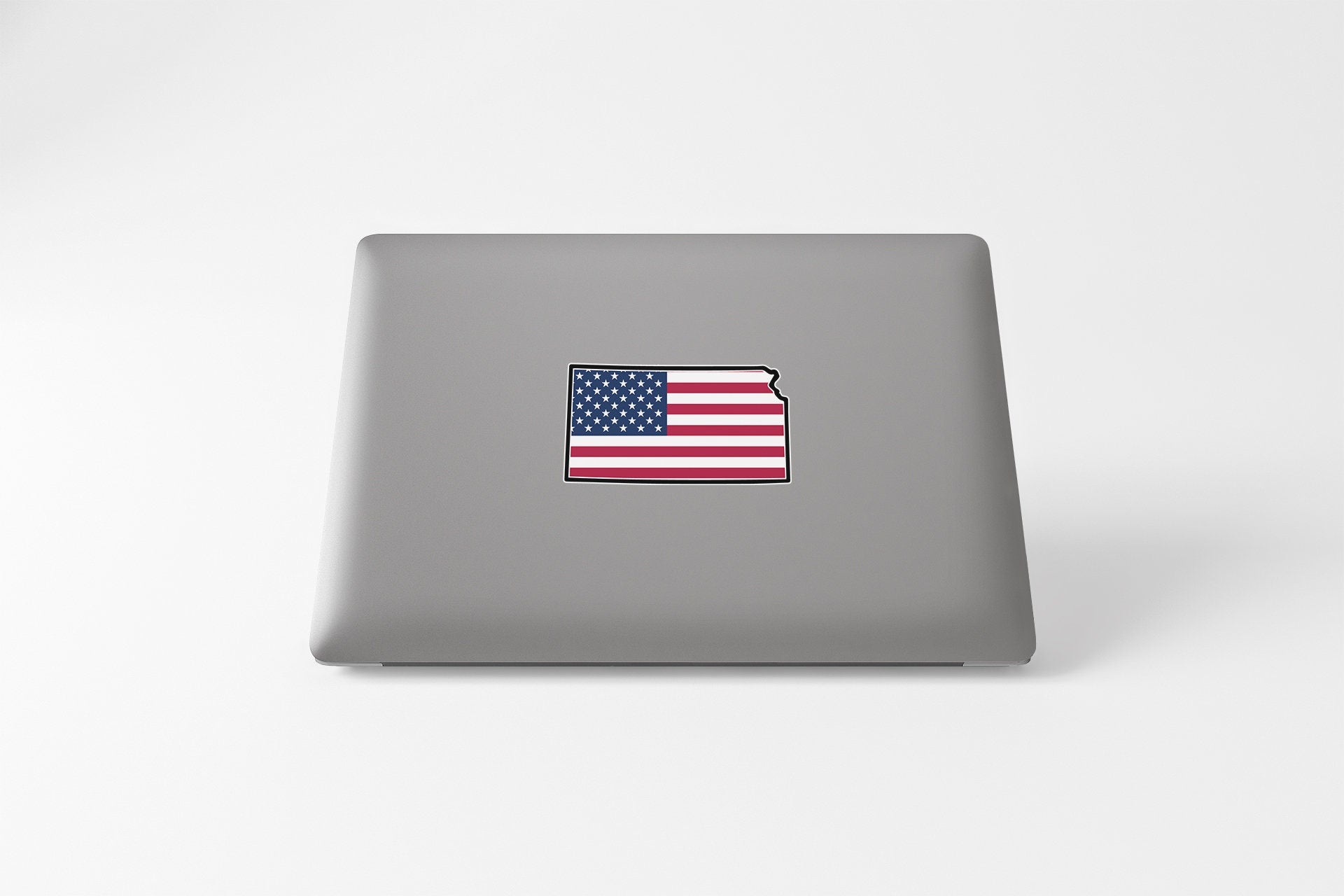 a laptop with a sticker of the state of arizona
