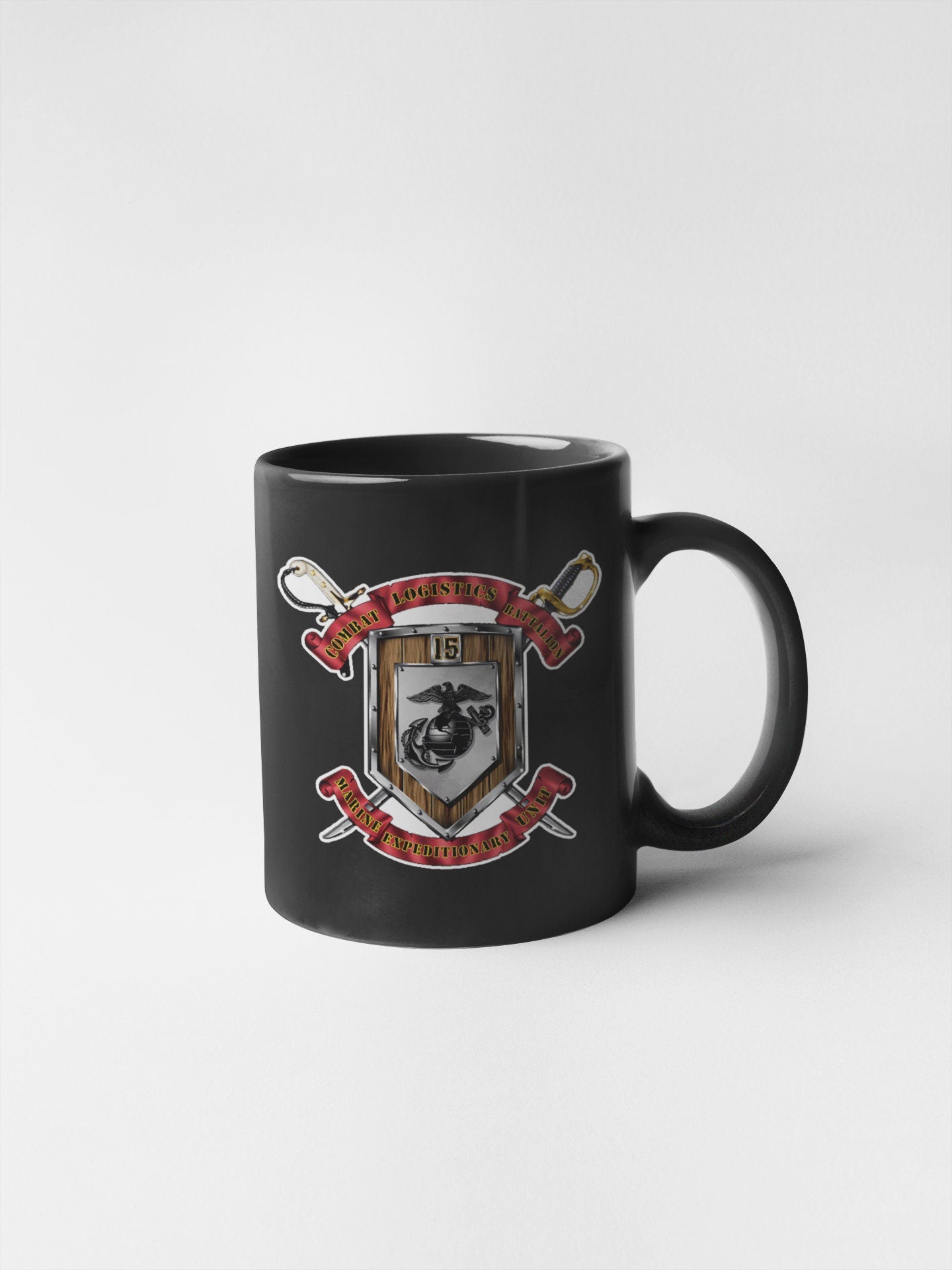 a black coffee mug with a shield and swords on it