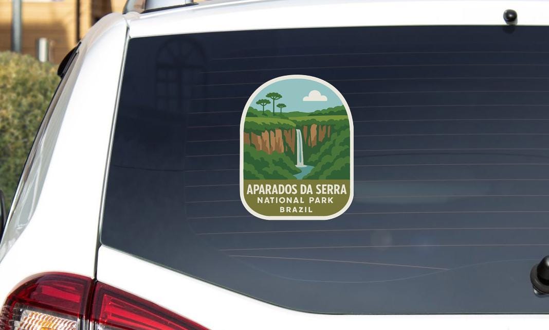 a sticker on the rear window of a car that says "APARADOS DA SERRA NATIONAL PARK BRAZIL".