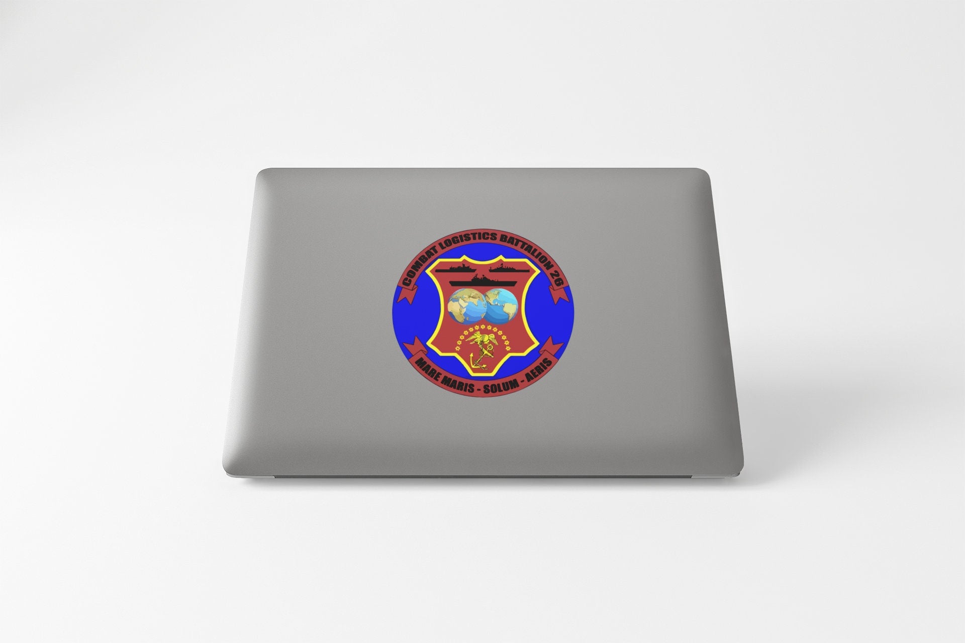 a laptop with a picture of a fire department emblem on it