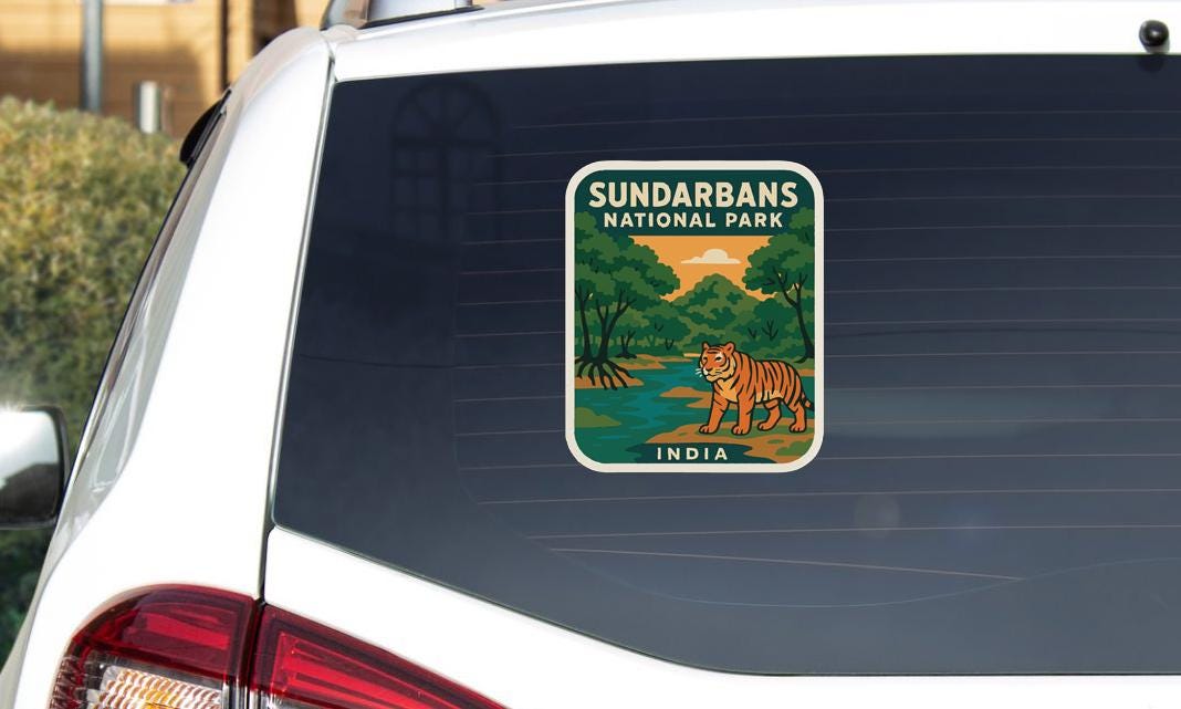 A sticker on the rear window of a car that says "SUNDARBANS NATIONAL PARK INDIA".