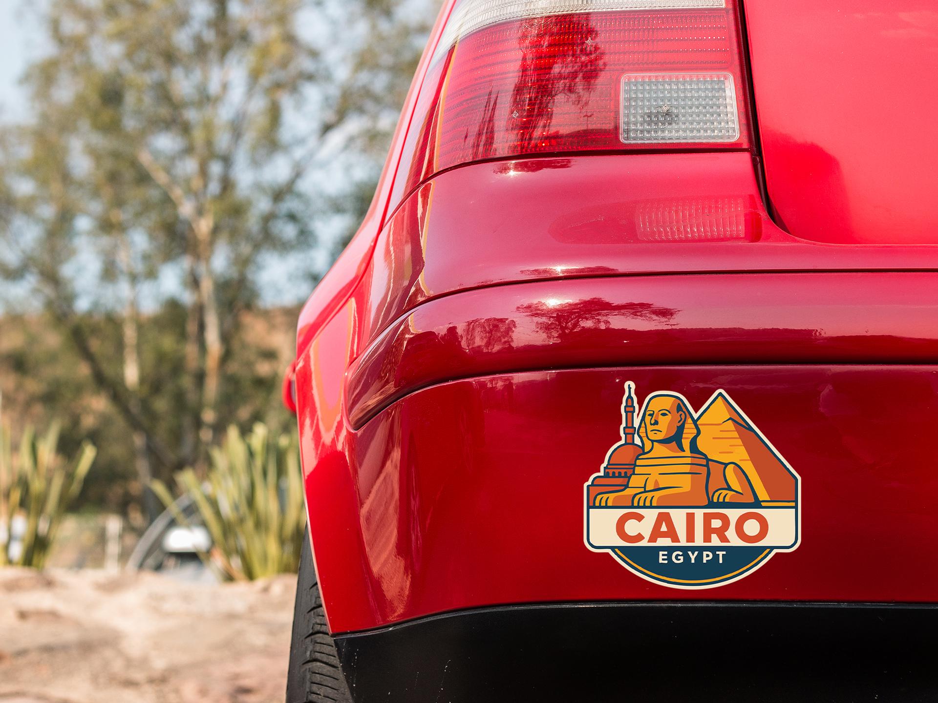 a close up of the tail end of a red car