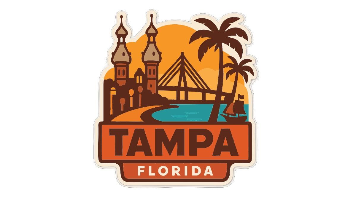 a sticker or logo with the text "TAMPA FLORIDA" prominently displayed. The sticker also includes various elements such as a bridge, palm trees, and a boat, creating a vibrant and colorful representation of the city of Tampa, Florida.