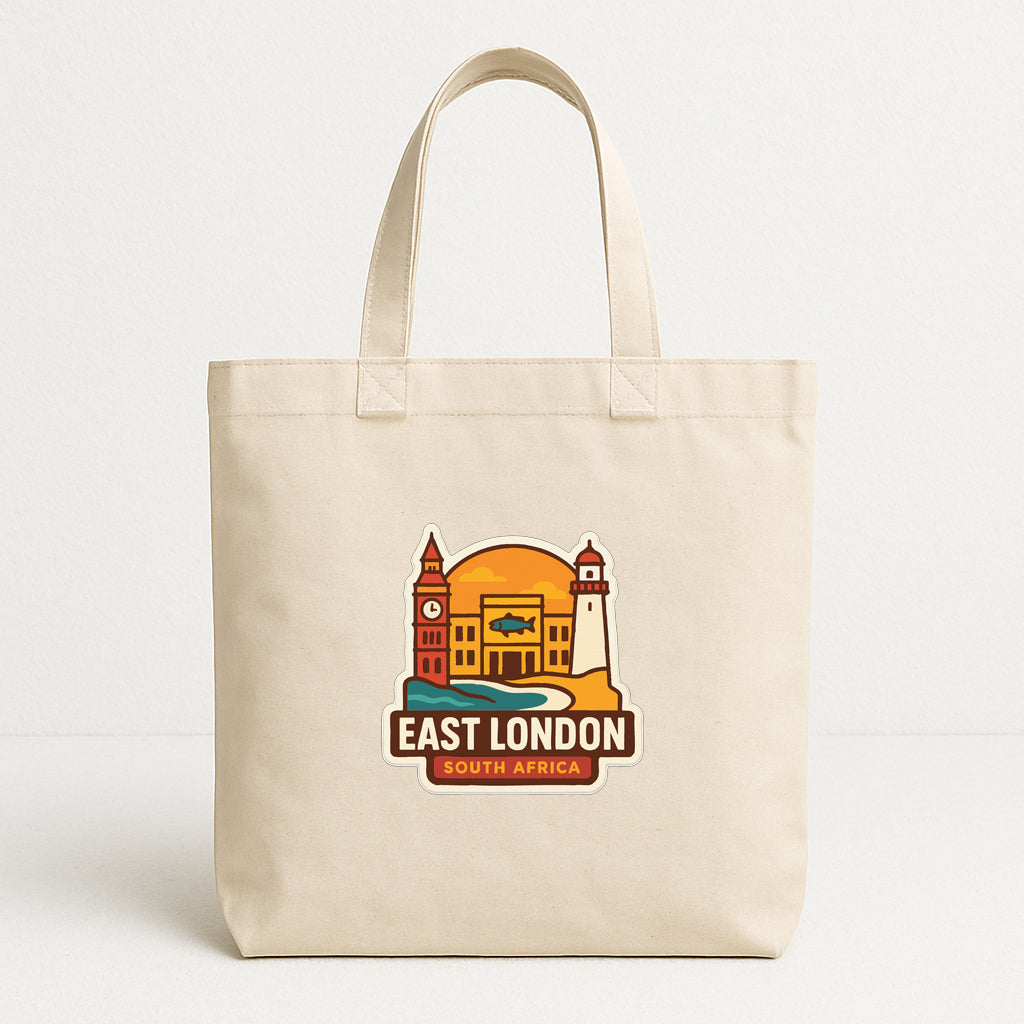 A beige tote bag with a printed design depicting landmarks and text that says "EAST LONDON SOUTH AFRICA".