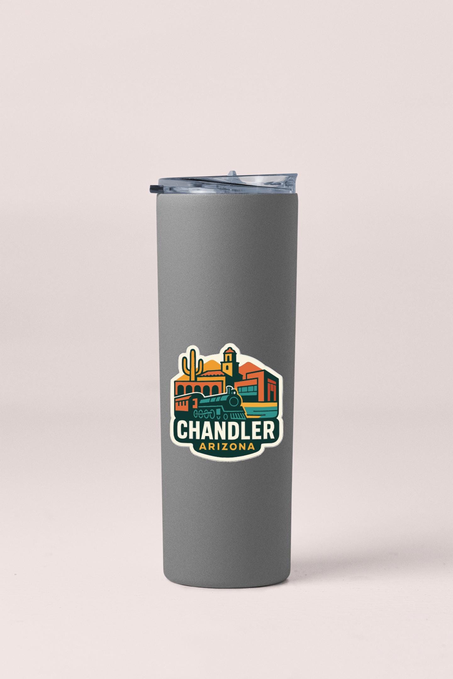 A gray insulated tumbler with a printed logo of Chandler, Arizona.