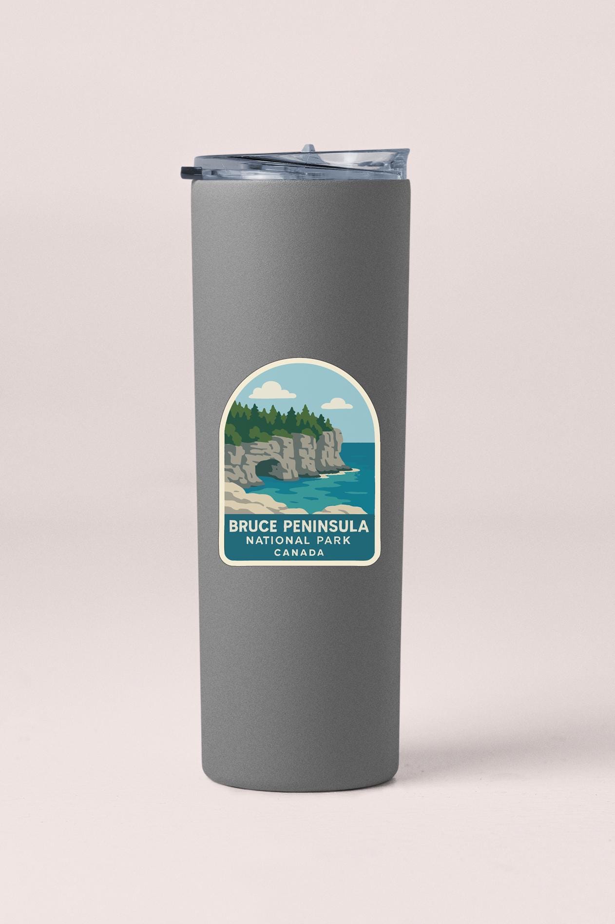A gray insulated tumbler with a label that says "Bruce Peninsula National Park Canada".