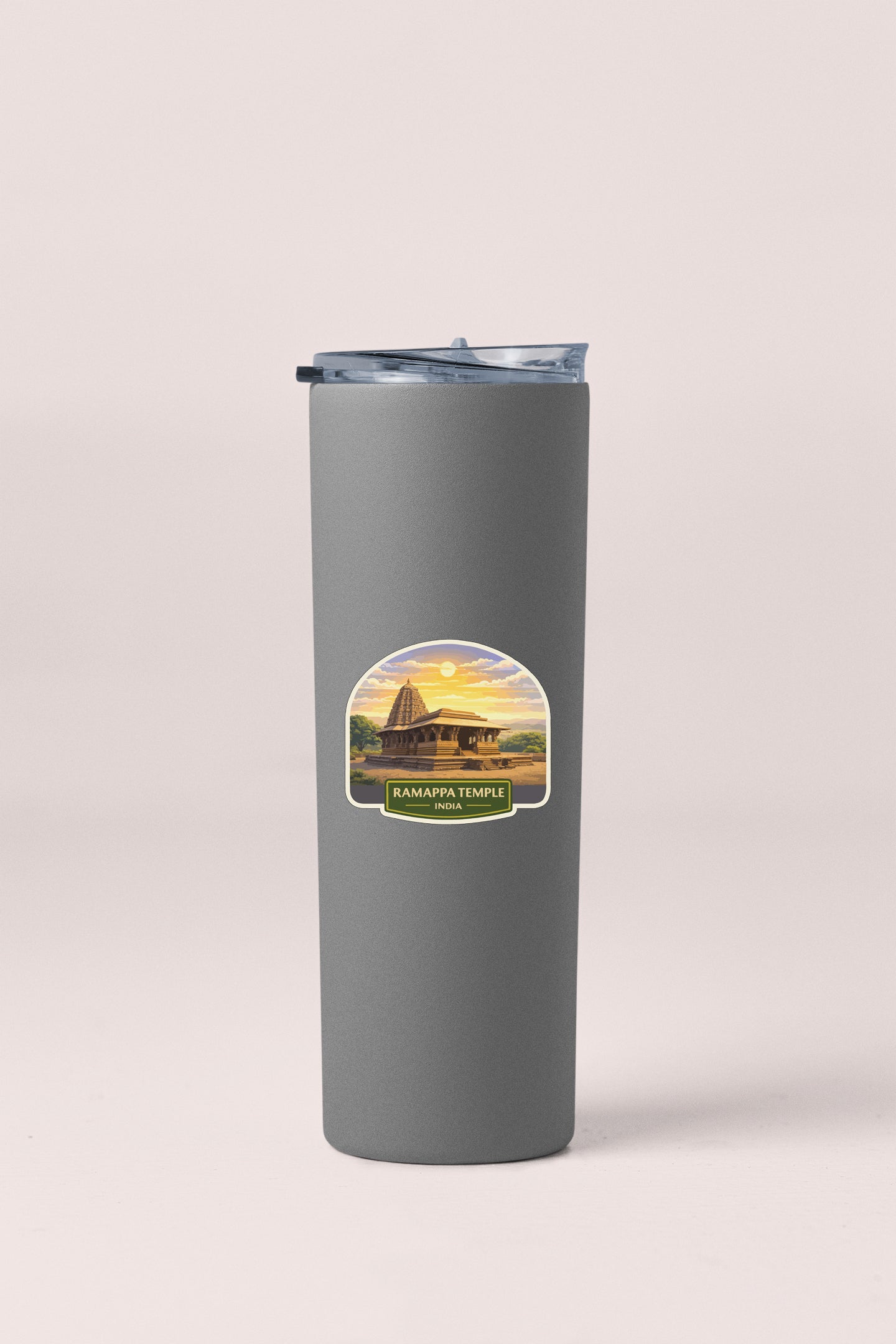 A gray insulated tumbler with a label that says "RAMAPTA TEMPLE INDIA" on it.