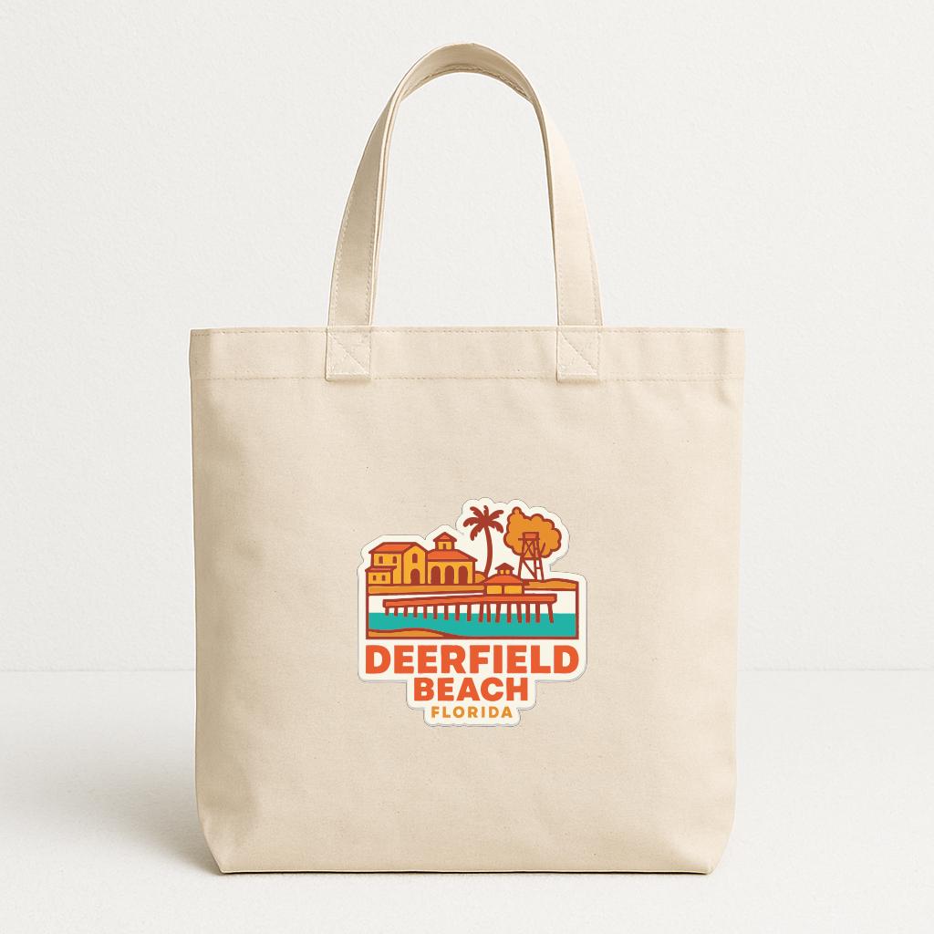 A beige tote bag with a printed design depicting Deerfield Beach, Florida.