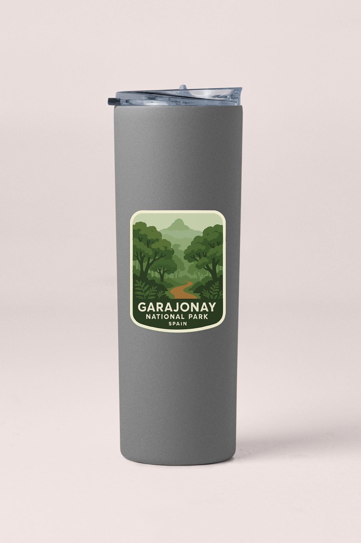 A gray insulated tumbler with a label that says "GARAJONAY NATIONAL PARK SPAIN".