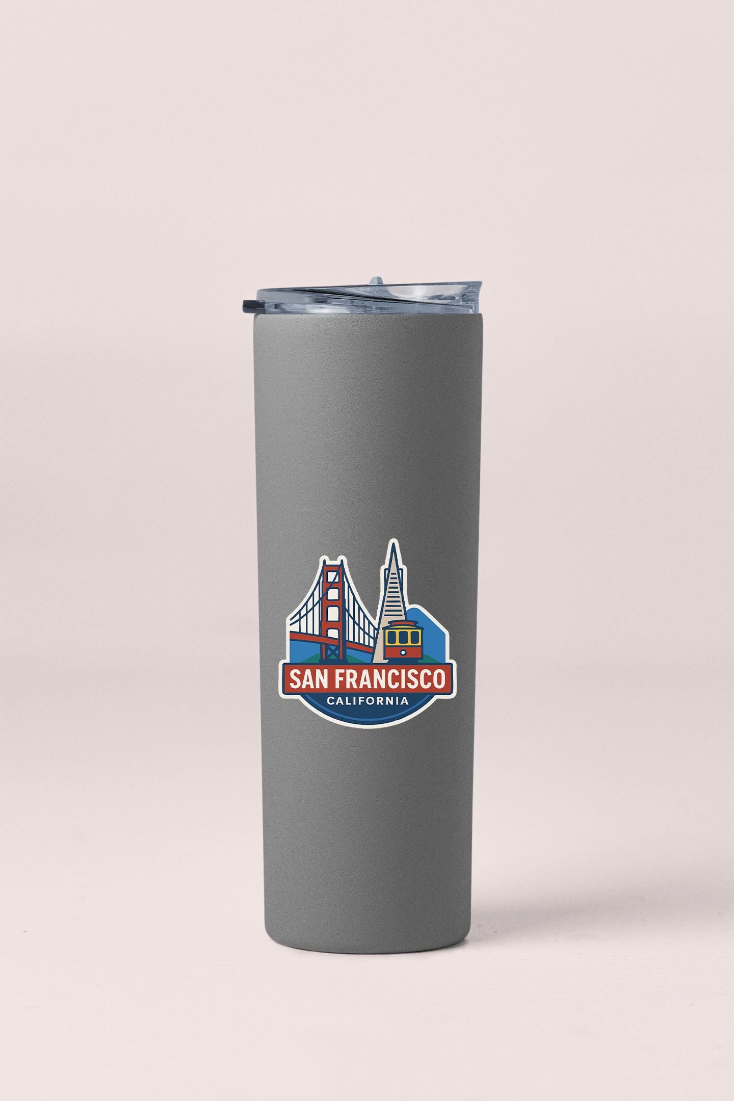 a gray travel mug with a san francisco skyline on it