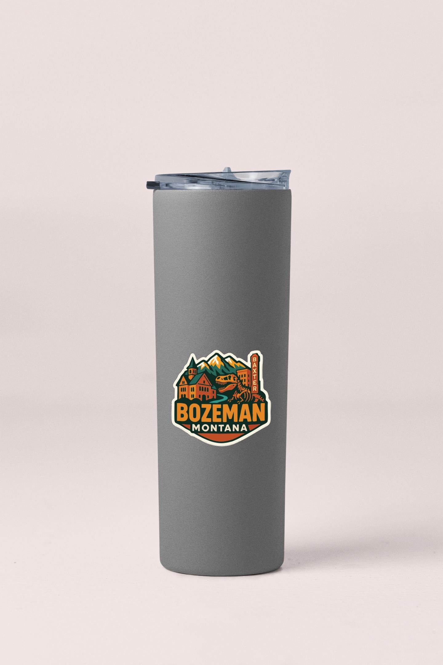 A gray insulated tumbler with a logo that says "BOZEMAN MONTANA".