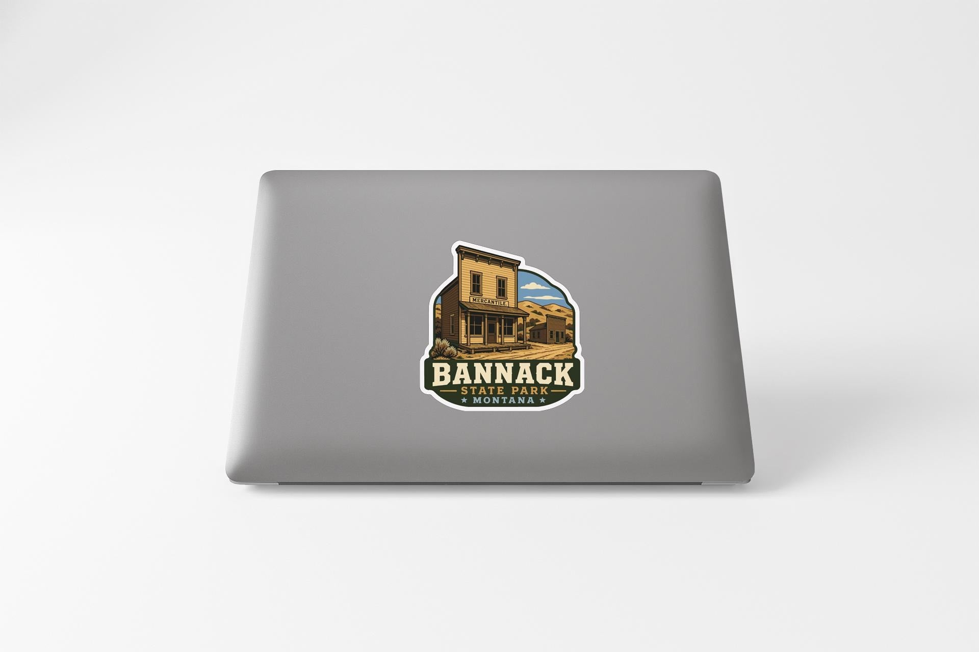 a sticker with a graphic of a building and the text "BANNACK ST. ST. ST. MORTON, MONTANA" printed on it.