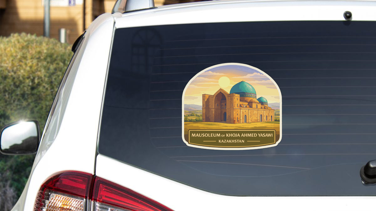 a sticker on the rear window of a car, depicting a mosque with a blue dome and a golden plaque that reads "MAUSOLEUM or KHOAHMEYD YASAWI KAZKHSTAN".