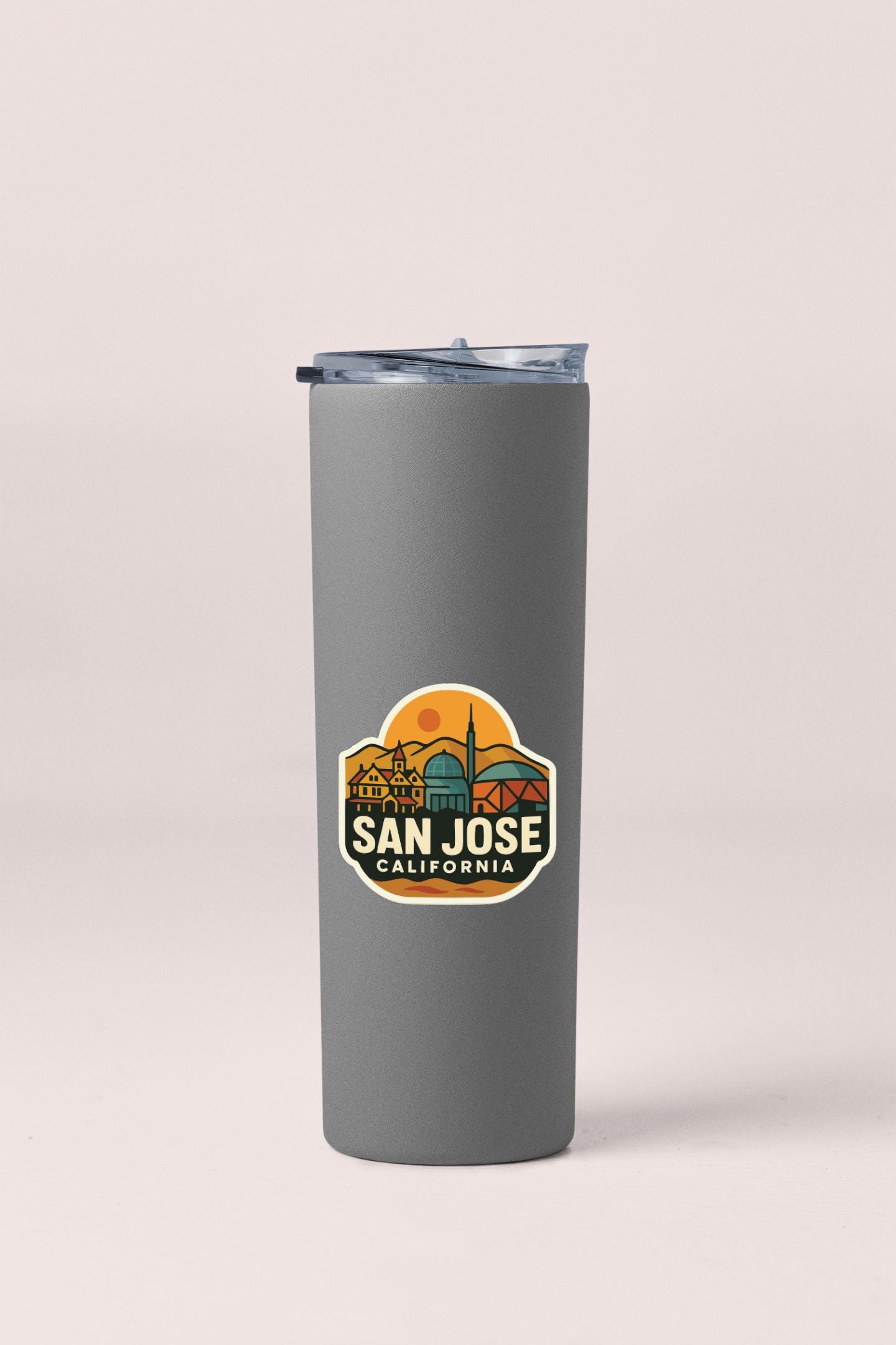 A gray insulated tumbler with a sticker that says "SAN JOSE, CALIFORNIA".