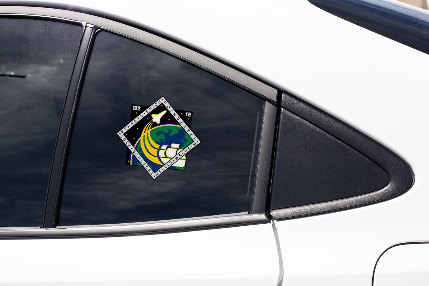 a close up of a car window with a sticker on it