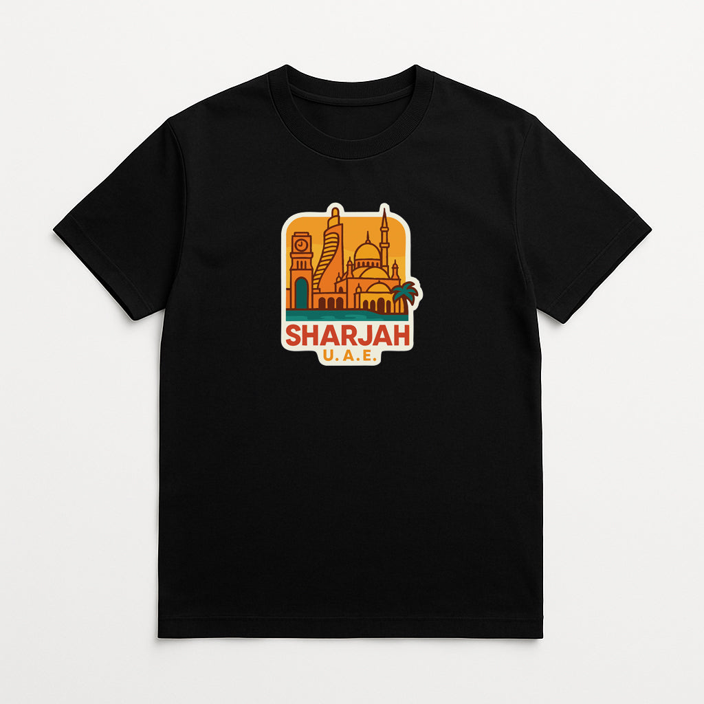 A black t-shirt with a graphic design depicting the skyline of Sharjah, United Arab Emirates.