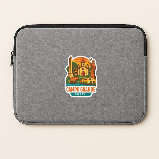 A gray laptop sleeve with a colorful sticker depicting the landmarks of Campo Grande, Brazil.