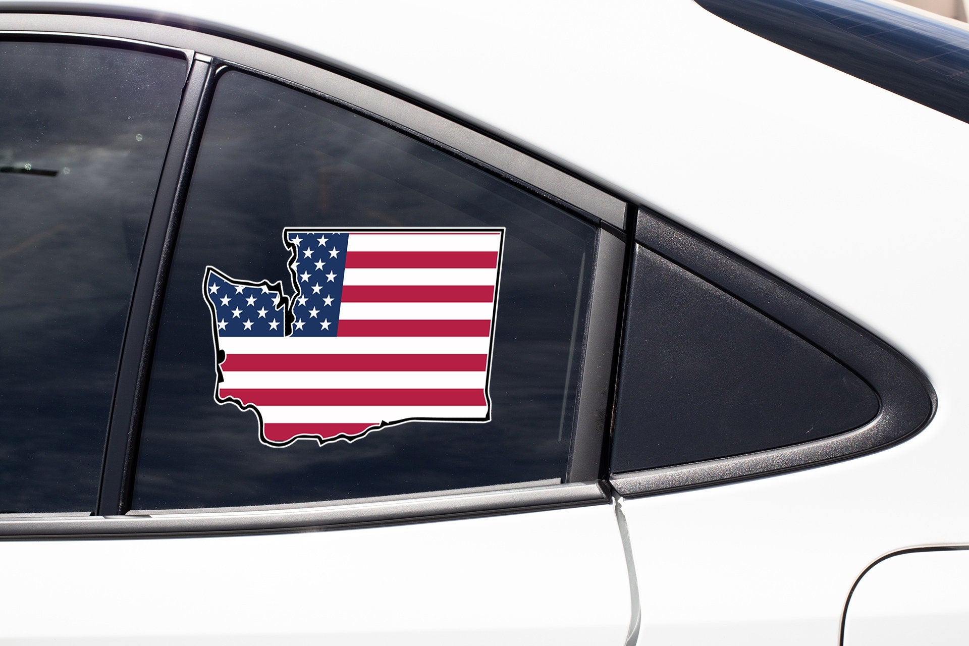 a car with a sticker of the state of texas on it