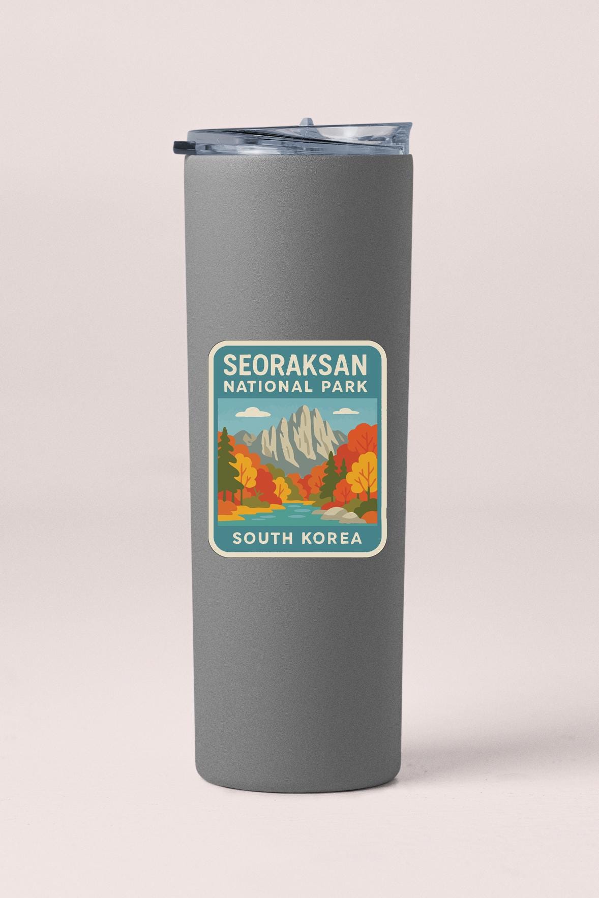 A gray insulated tumbler with a label that says "SEORAKSAN NATIONAL PARK SOUTH KOREA".