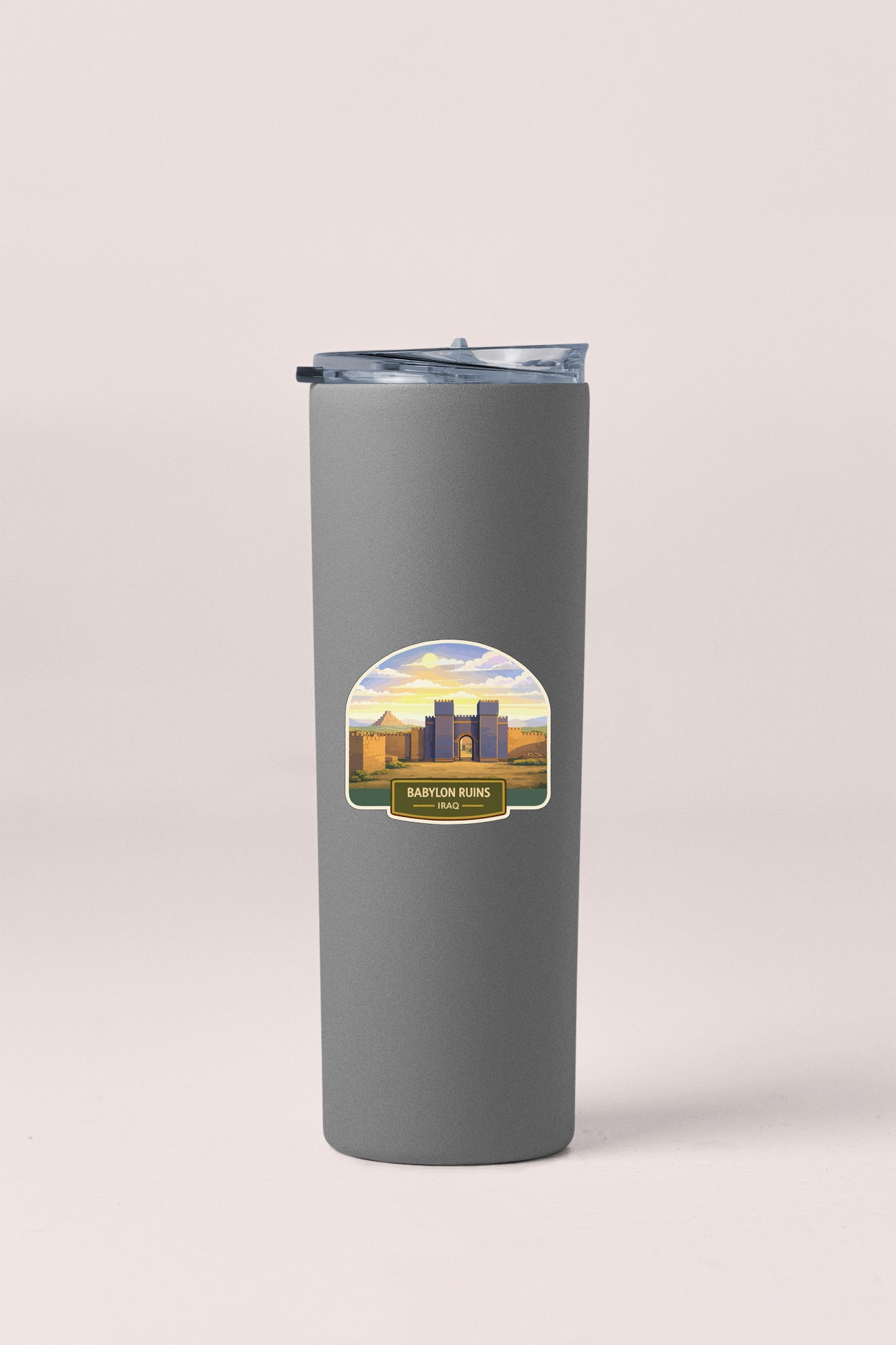 A gray insulated tumbler with a label that says "BARTON RUINS" and "IRAQ".