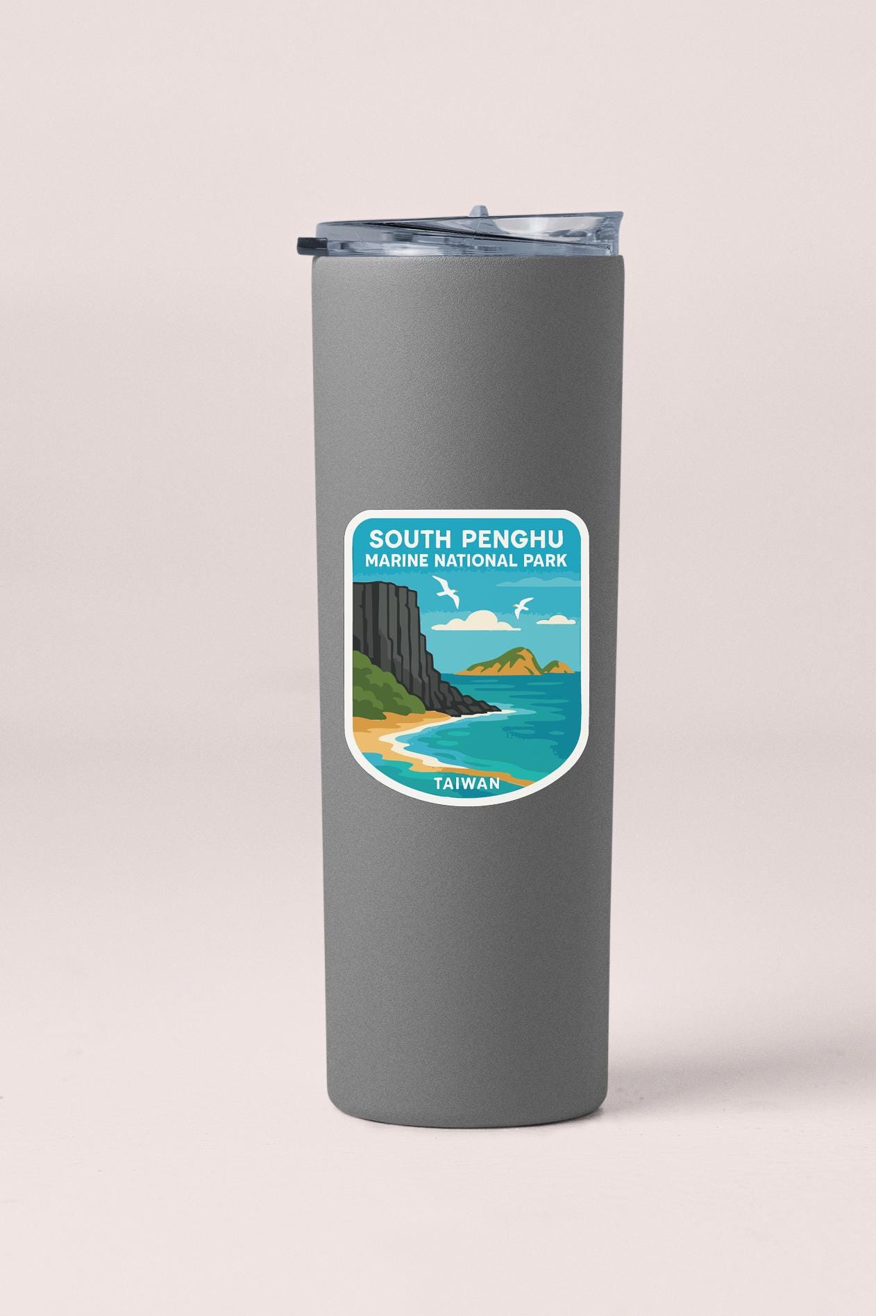 A gray insulated tumbler with a label that says "South Penghu Marine National Park Taiwan".