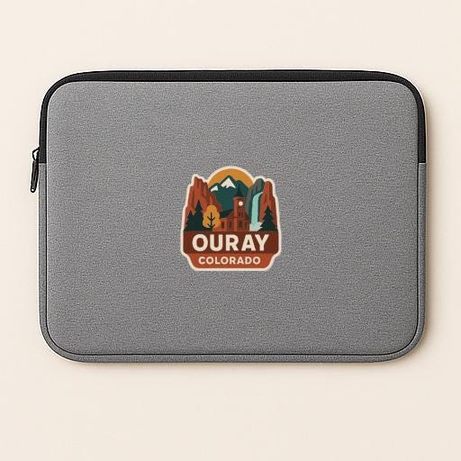 A gray laptop sleeve with a logo for Ouray, Colorado.