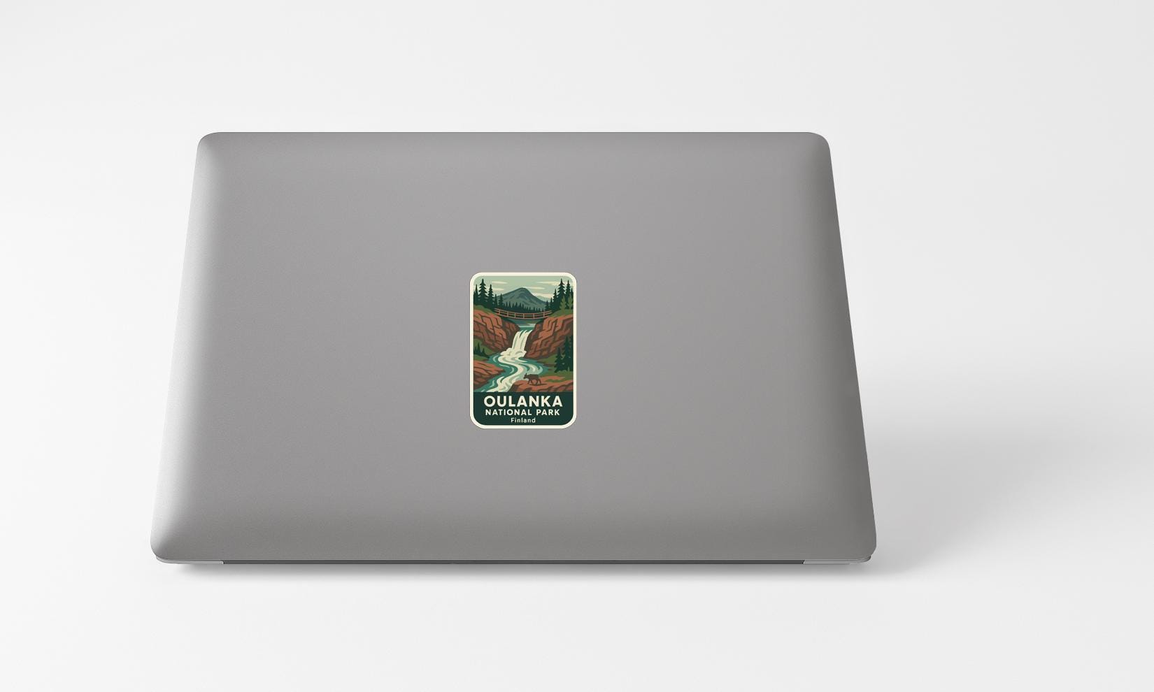 A sticker of Oulanka National Park on the back of a laptop computer.