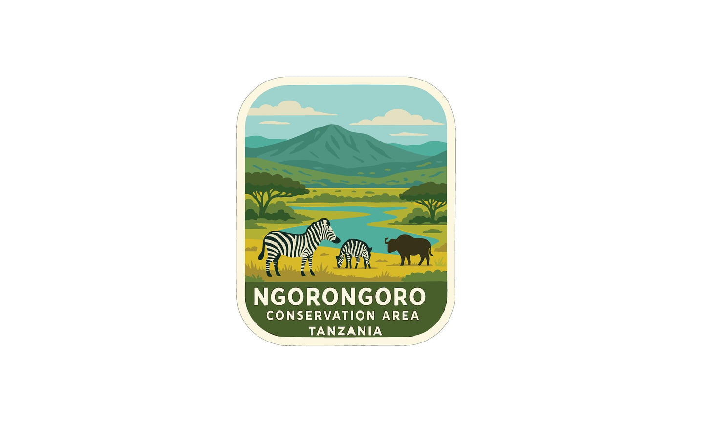 a sticker or label with a landscape scene depicting zebras, a buffalo, and a mountain range. The text "NGORONGOORO CONSERVATION AREA TANZANIA" is displayed prominently, indicating the location or name of the conservation area.