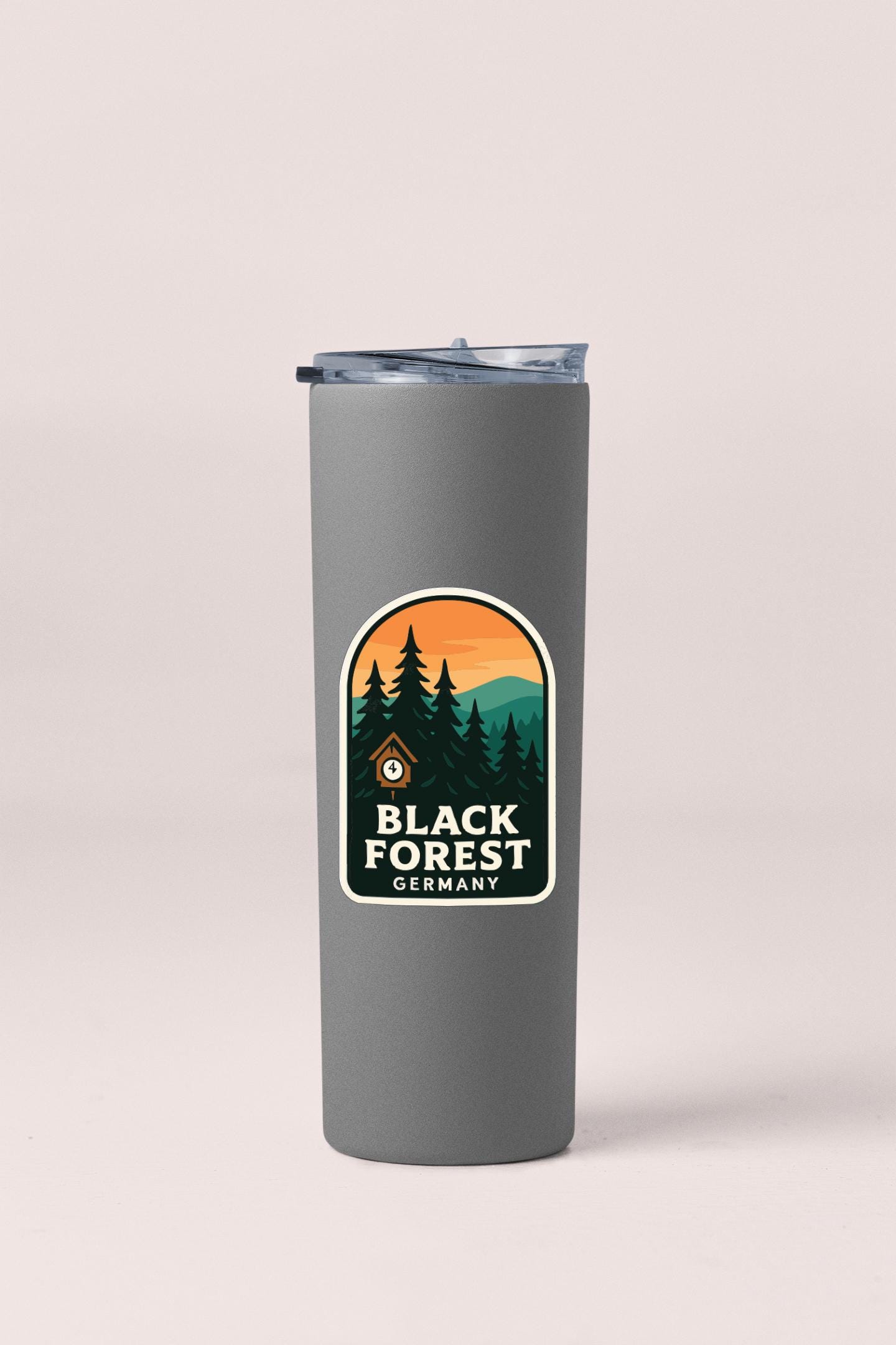 A gray insulated tumbler with a label that says "Black Forest Germany" on it.