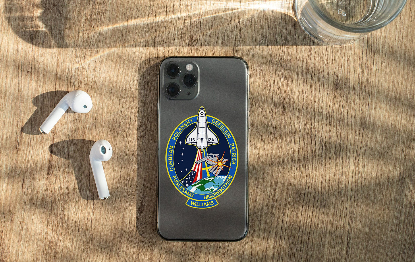 an iphone case with a picture of a space shuttle on it
