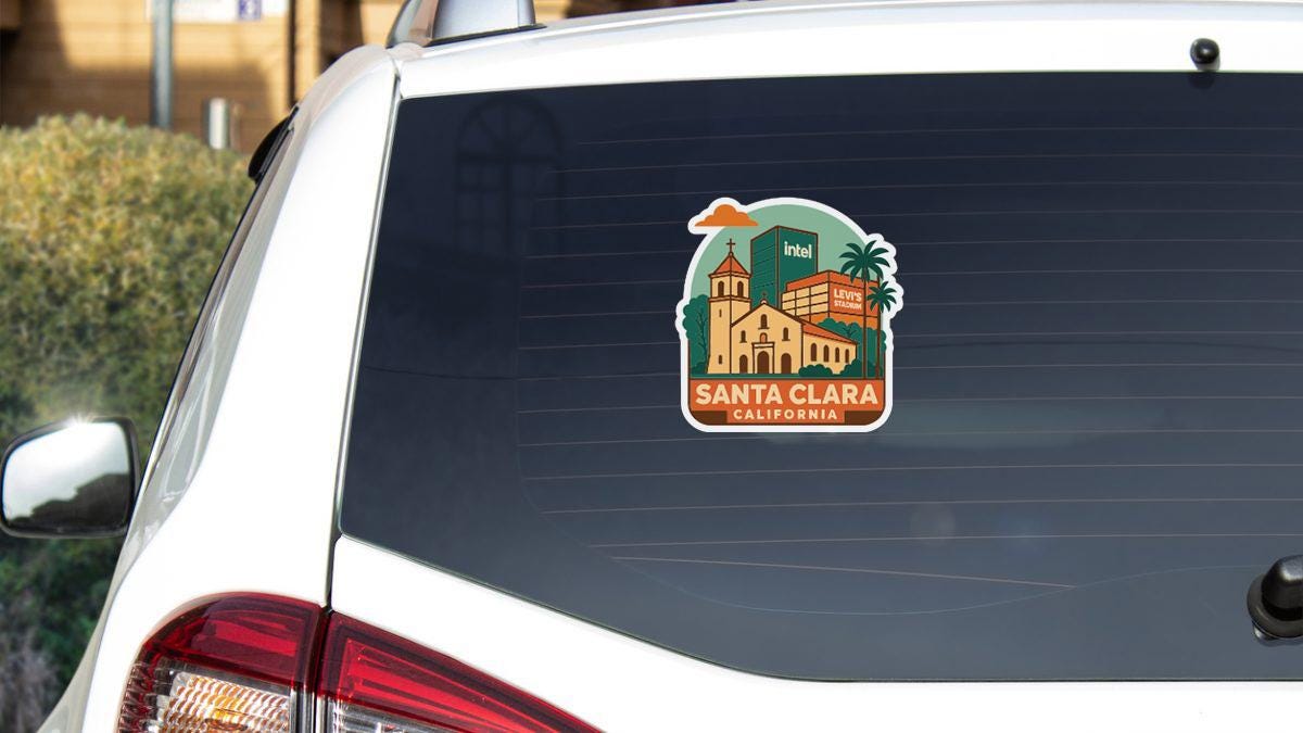 a sticker on the rear window of a white car, depicting Santa Clara, California.